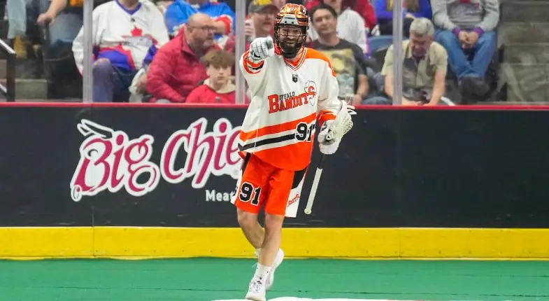 Buffalo Bandits lacrosse player celebrating on the field.